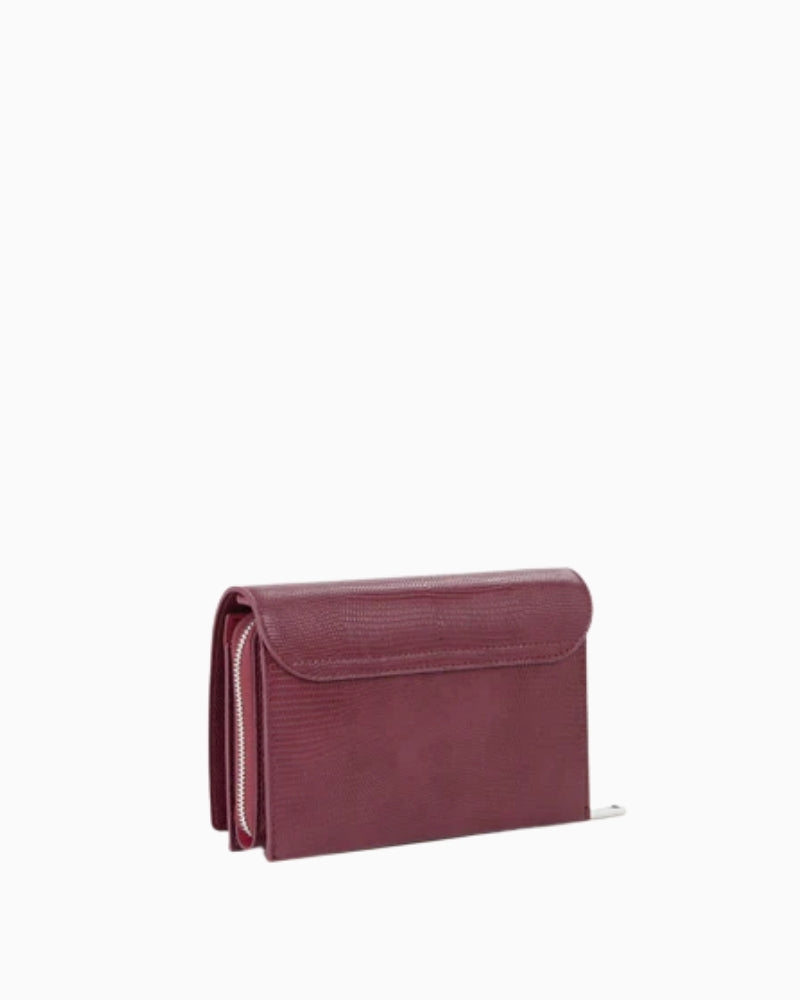 Back view of Ember clutch showing slim profile and refined finish