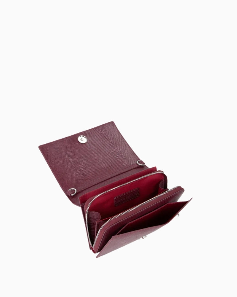 Inside compartments of Ember handbag by Valentino for easy organisation