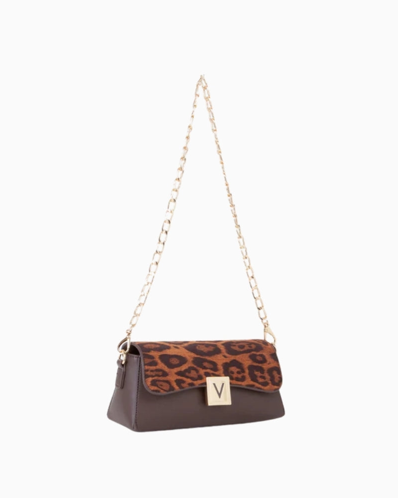 Side view of Valentino shoulder bag showing mix of suede and nappa textures