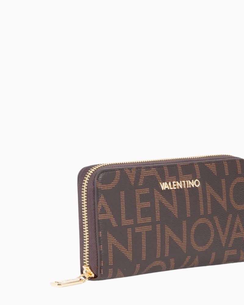 Close-up of recycled grain-effect faux leather with subtle branding