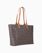 Side profile of Regina shopping bag in grain-effect faux leather