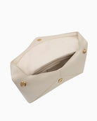 Side angle of Valentino Stella Pochette showing soft structure and spacious interior