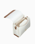 Open view of Valentino Alexia Bag featuring spacious interior, magnetic flap closure, and beige lining