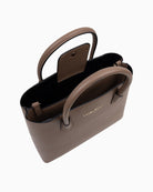 Inside view of Valentino Faith tote bag showing zip divider, inner pockets, and soft black lining