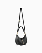 Front angle of Valentino hobo bag showing relaxed shape and modern, minimal design