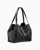 Side angle of black Valentino Fania bag showing roomy shape and sleek double strap design