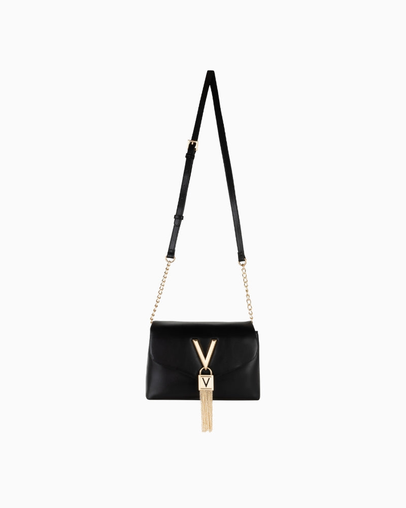Valentino Stella Flap Bag in black with gold V-logo, sleek rectangular shape, and elegant shoulder strap
