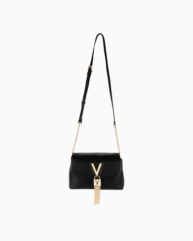 Front view of black Valentino Stella bag featuring flap closure and gold chain accent