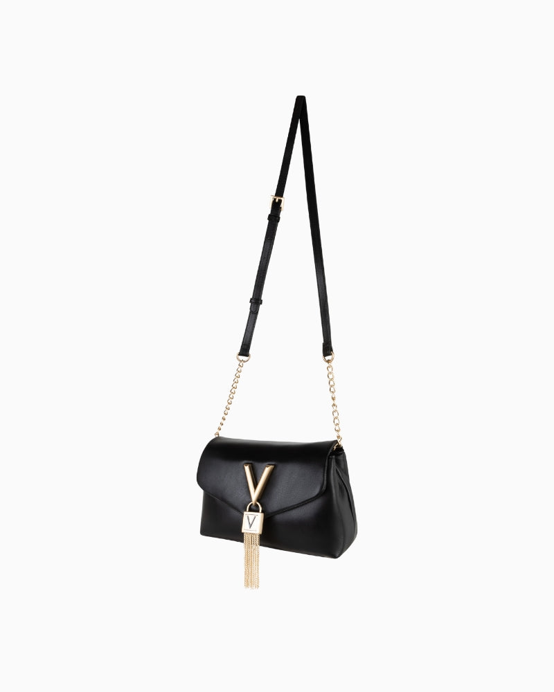 Side view of Stella Flap Bag by Valentino showing structured silhouette and long dual strap design