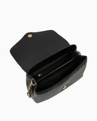 Interior view of Stella Flap Bag showing organized compartments and zip pocket