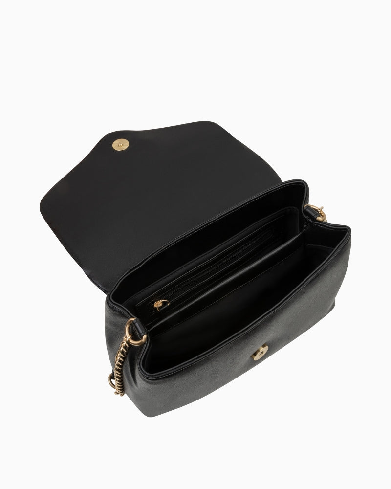 Interior view of Stella Flap Bag showing organized compartments and zip pocket