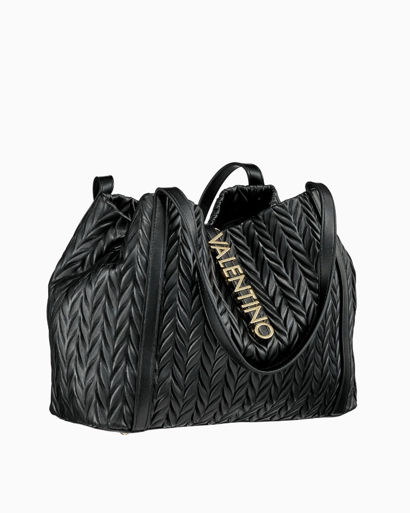 Side angle of black Valentino Fania bag showing roomy shape and sleek double strap design