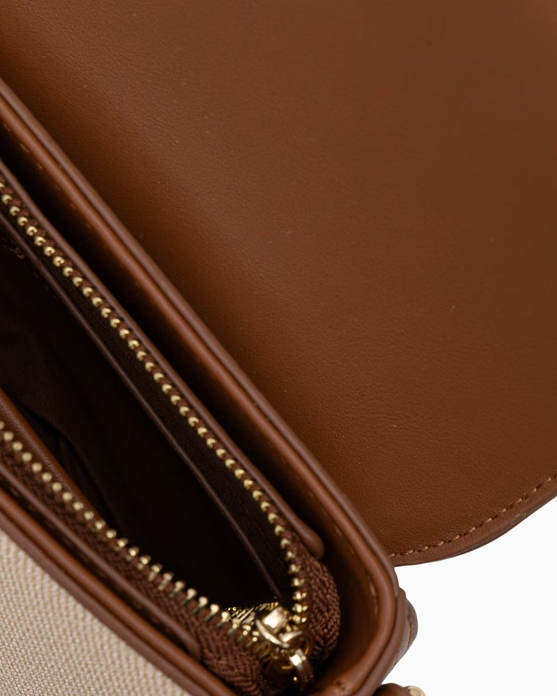 Valentino natural shoulder bag interior compartments view
