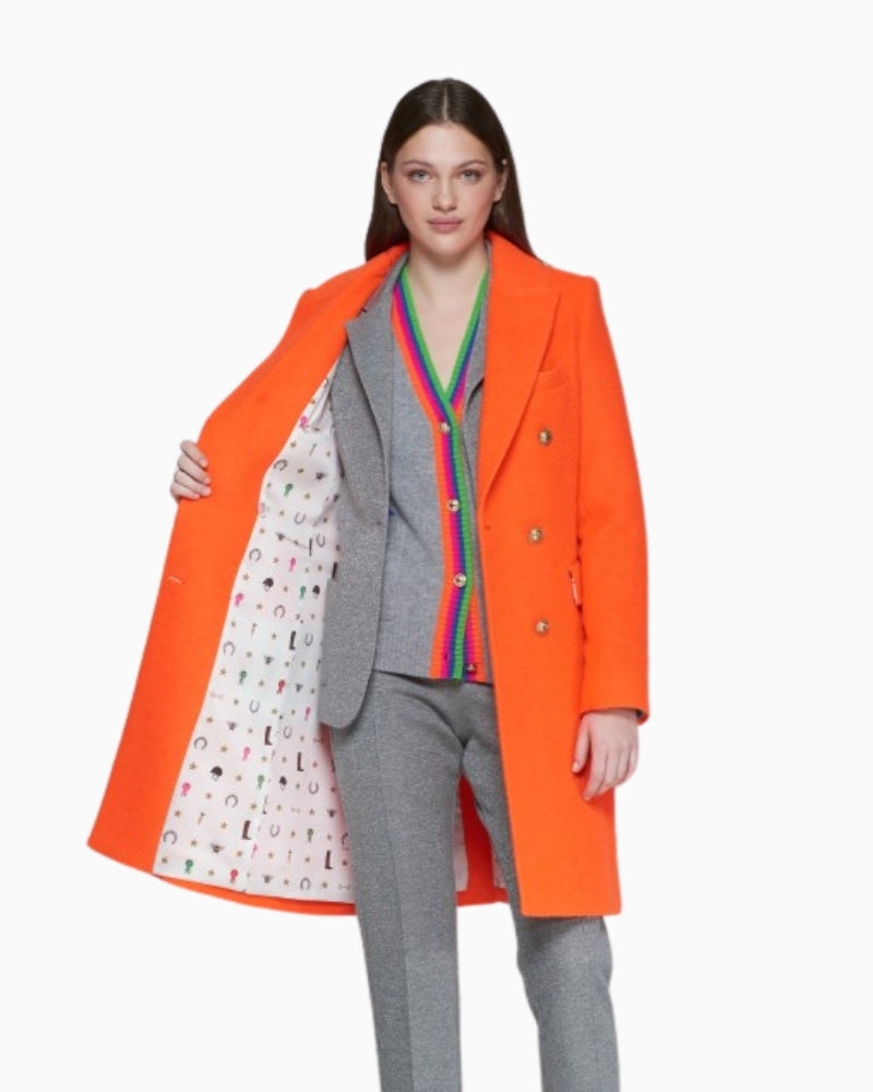 Detail of fuchsia contrast collar and printed inner lining