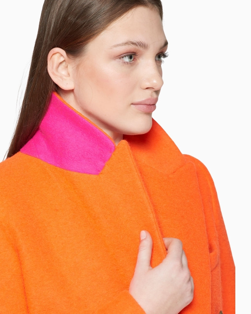 Detail of fuchsia contrast collar and printed inner lining