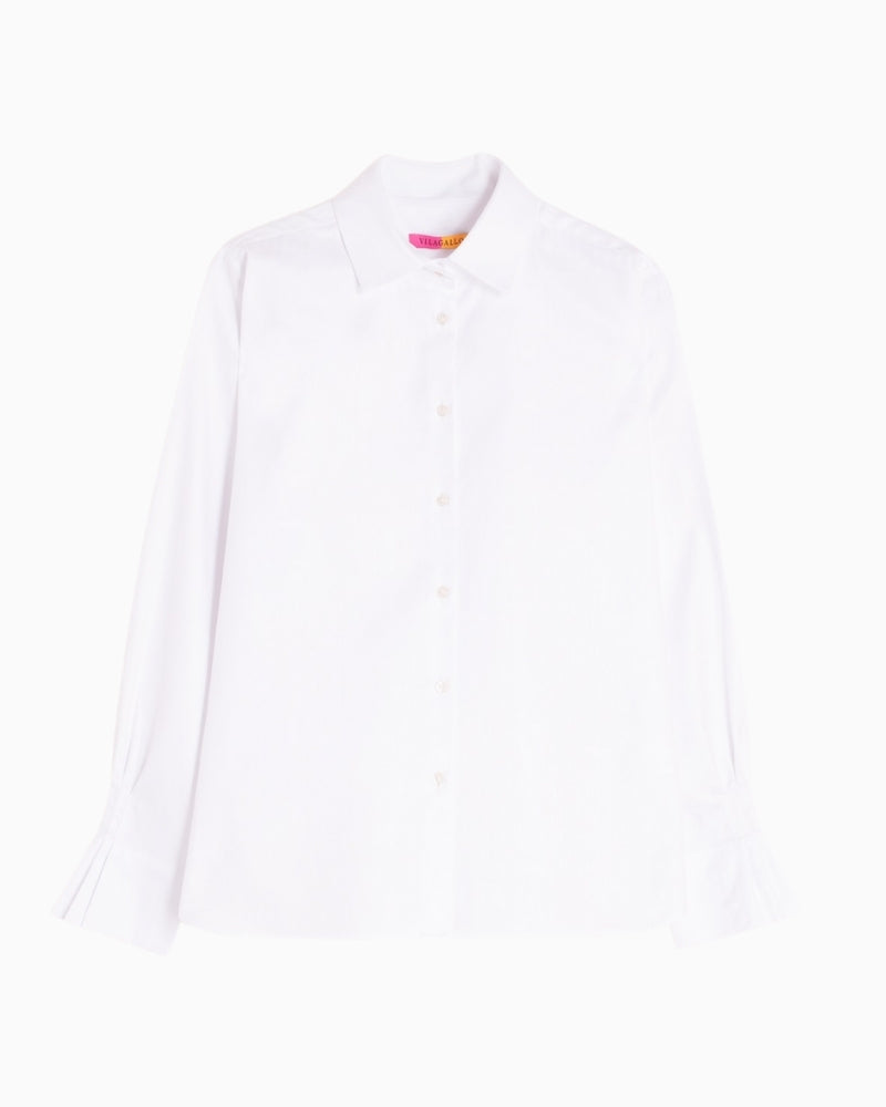 Front view of women’s button-down shirt with curved hem and classic collar