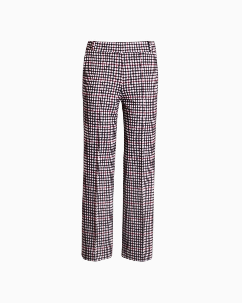 Close-up of houndstooth knit fabric and side pocket detail on Vilagallo trousers