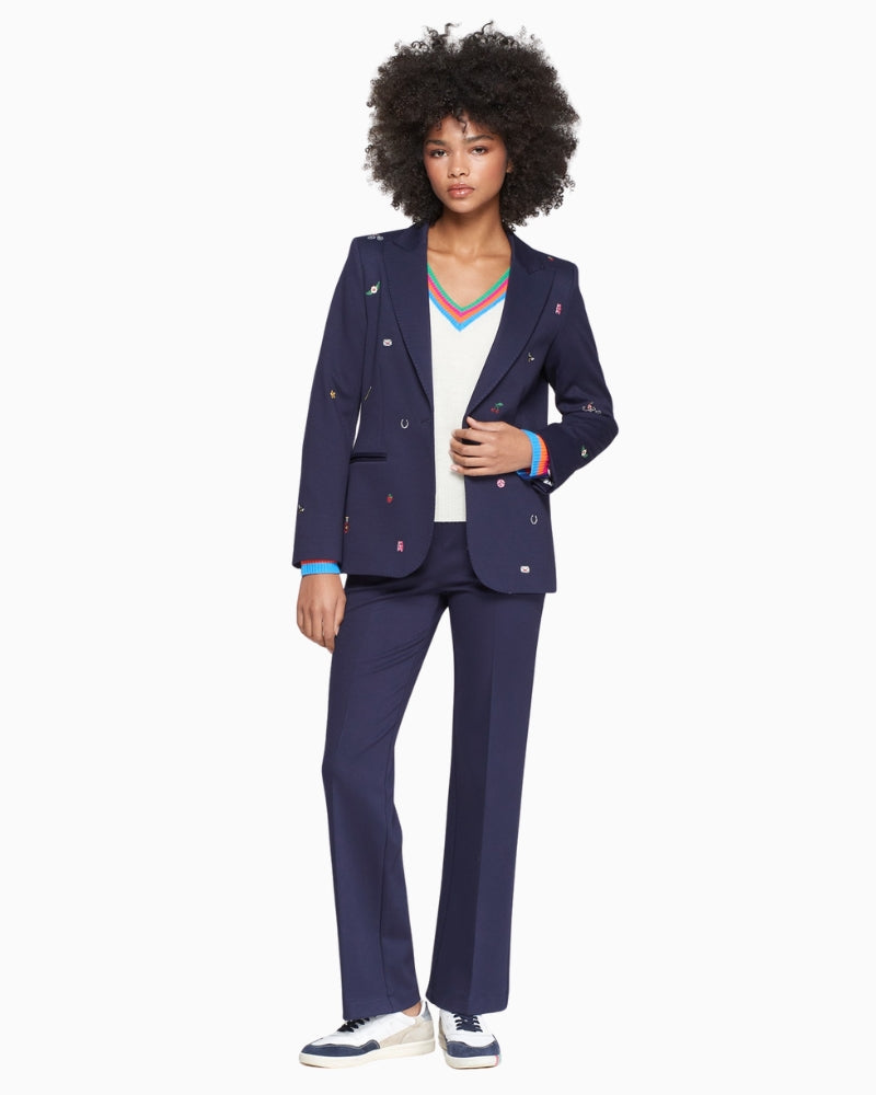 Model wearing Vilagallo Navy Embroidered Blazer paired with trousers and sneakers