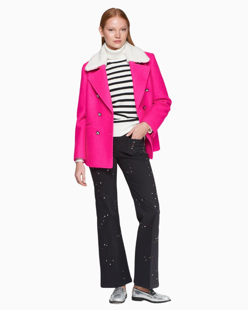 Model wearing Vilagallo Jacket with contrasting buttons and sherpa collar detail