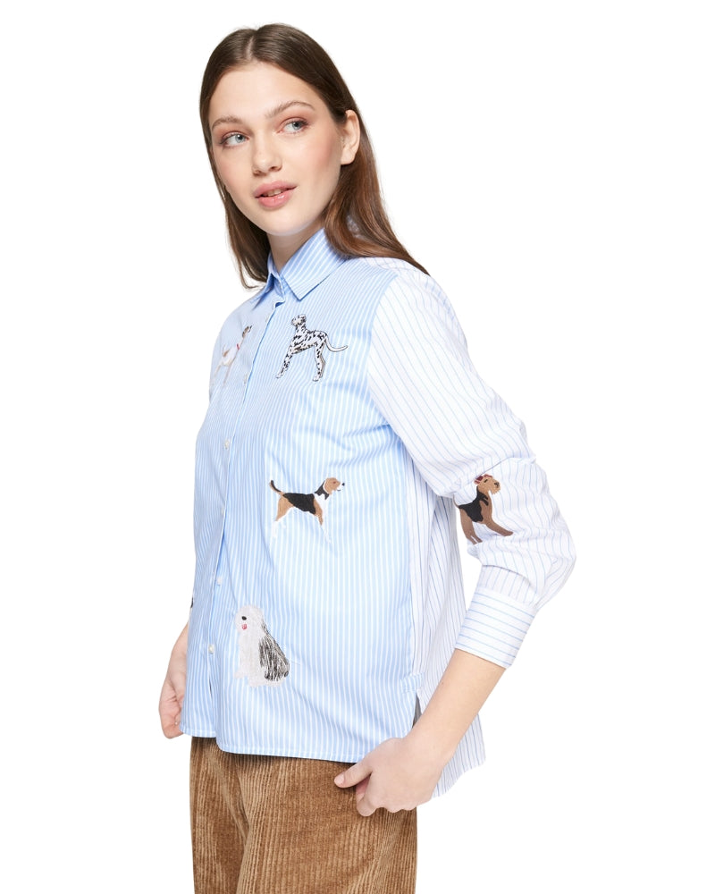 Sleeve detail of blue striped Vilagallo shirt with embroidered dog design