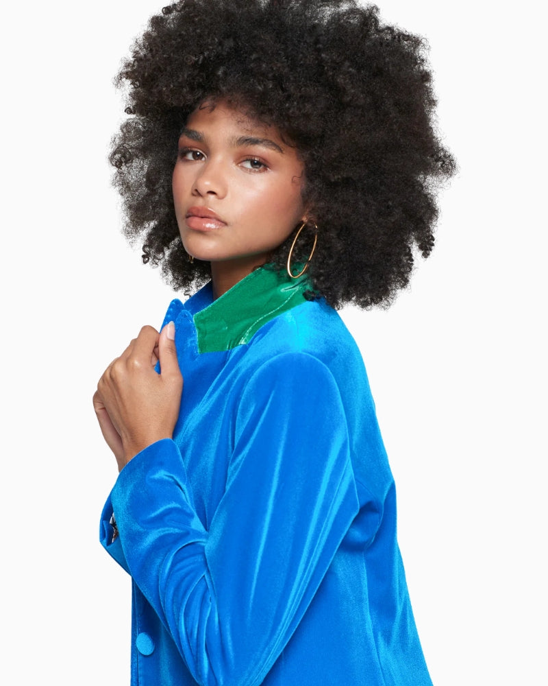 Side view showing vibrant blue velvet texture and sharp cut