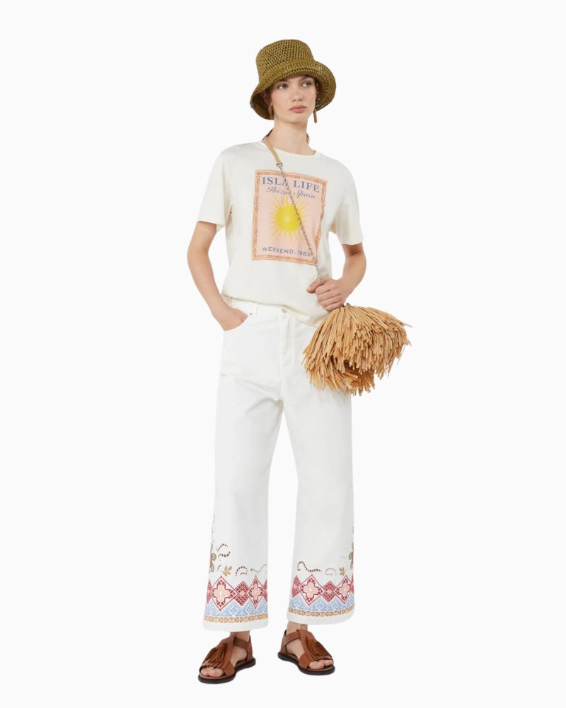 Woman wearing Weekend Max Mara Adunco white trousers front view – Áines Boutique
