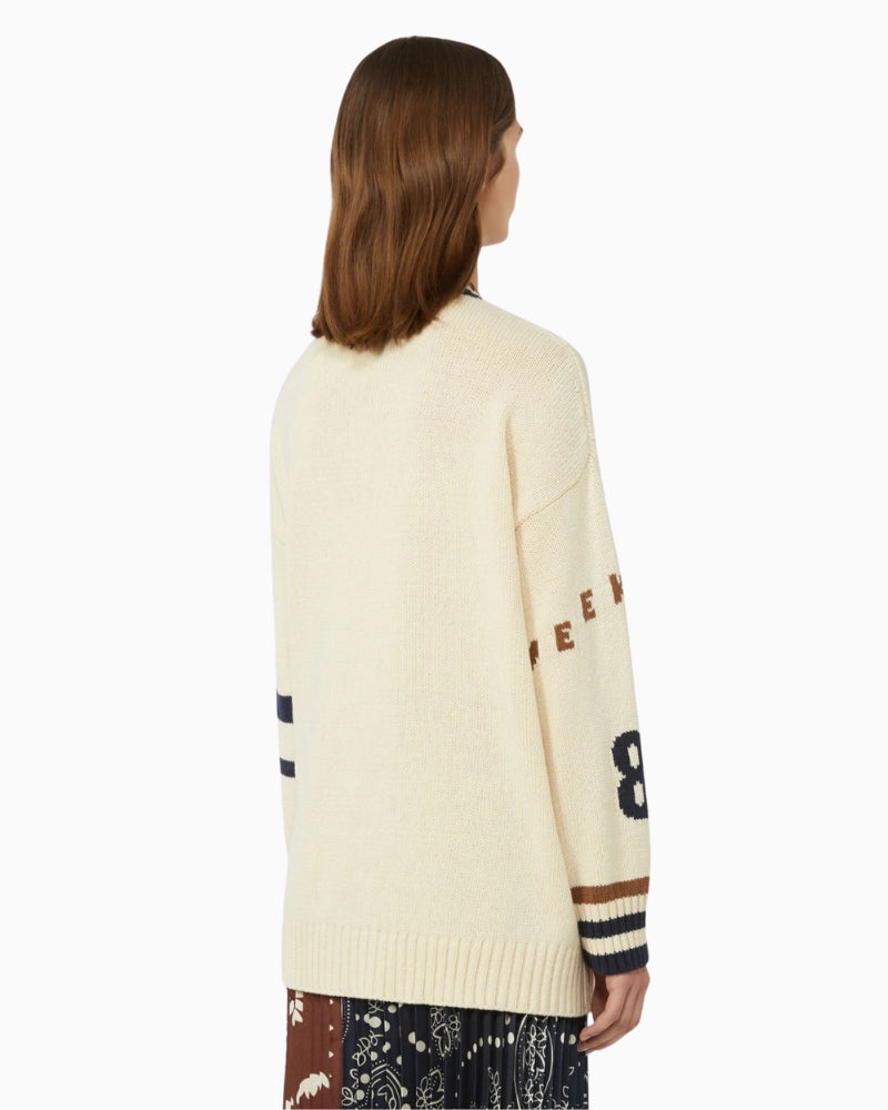 Woman wearing Weekend Max Mara oversized cardigan cream, back view – Áines Boutique