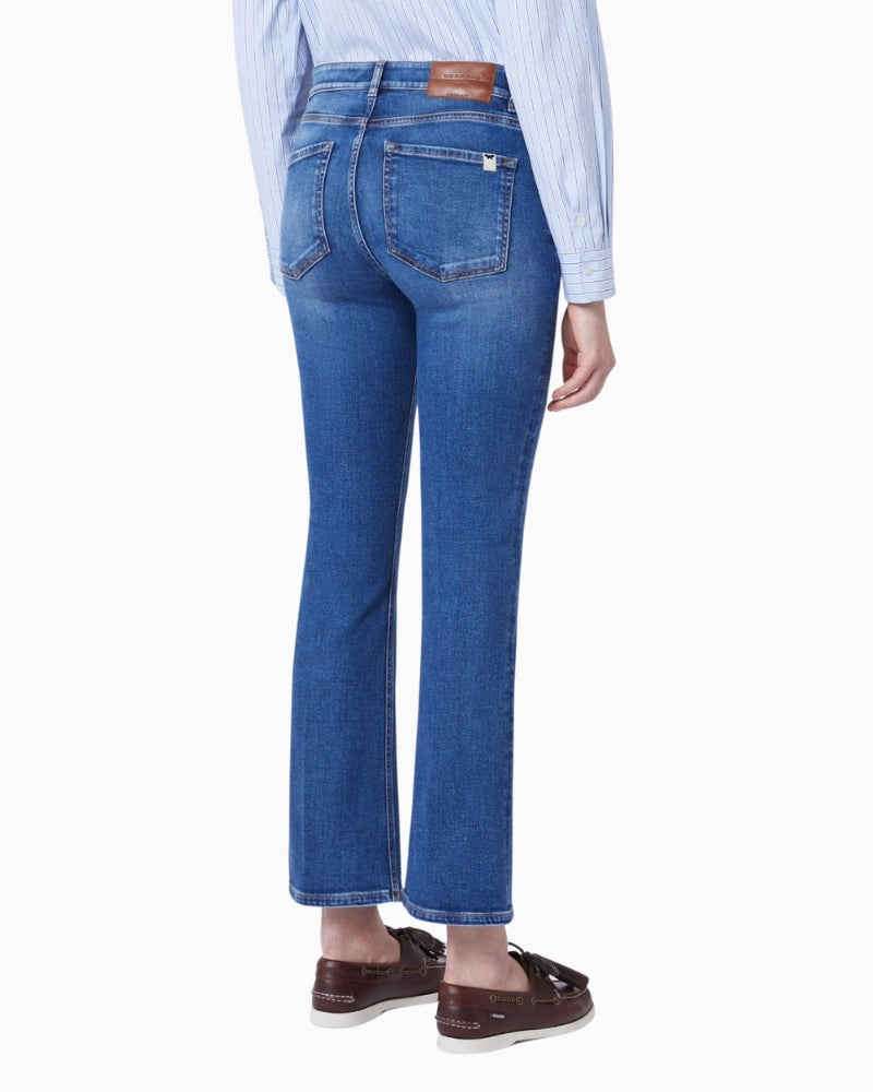 Woman wearing Weekend Max Mara super stretch skinny jeans navy, back view – Áines Boutique