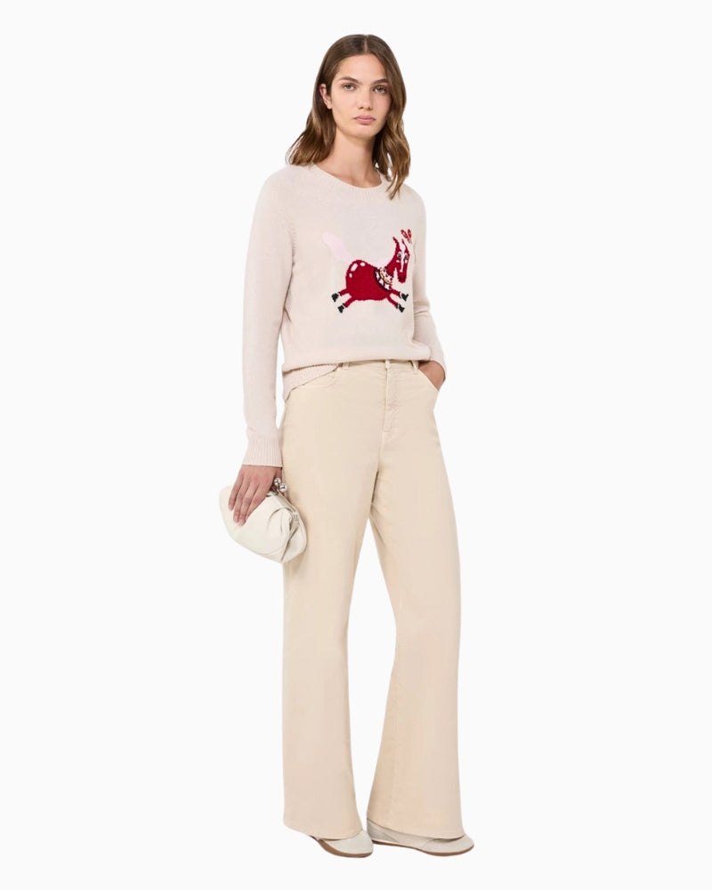 Woman wearing Weekend Max Mara wide-leg cotton trousers sand, front view – Áines Boutique