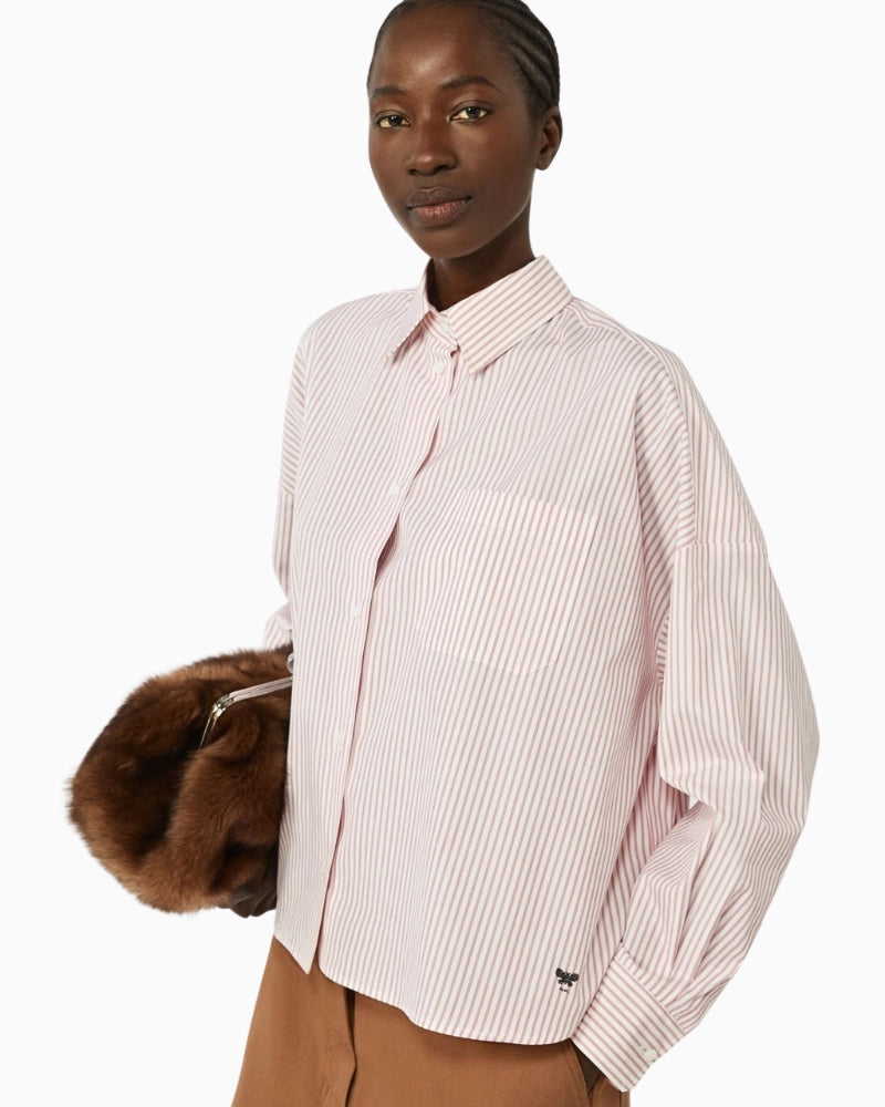 Woman wearing Weekend Max Mara oversized cotton shirt pink, side view – Áines Boutique