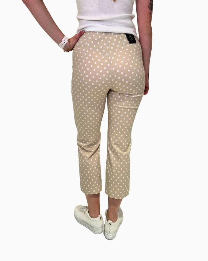Back view of Robell Joella 09 beige polka‑dot cropped trousers, showing straight leg and clean pull‑on waistband