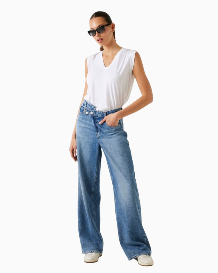 Model view of White jersey V-neck top by GUESS with buttoned epaulettes