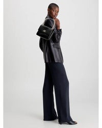 Calvin Klein - Re-Lock EW Convertable Crossbody Bag in Black - Front View