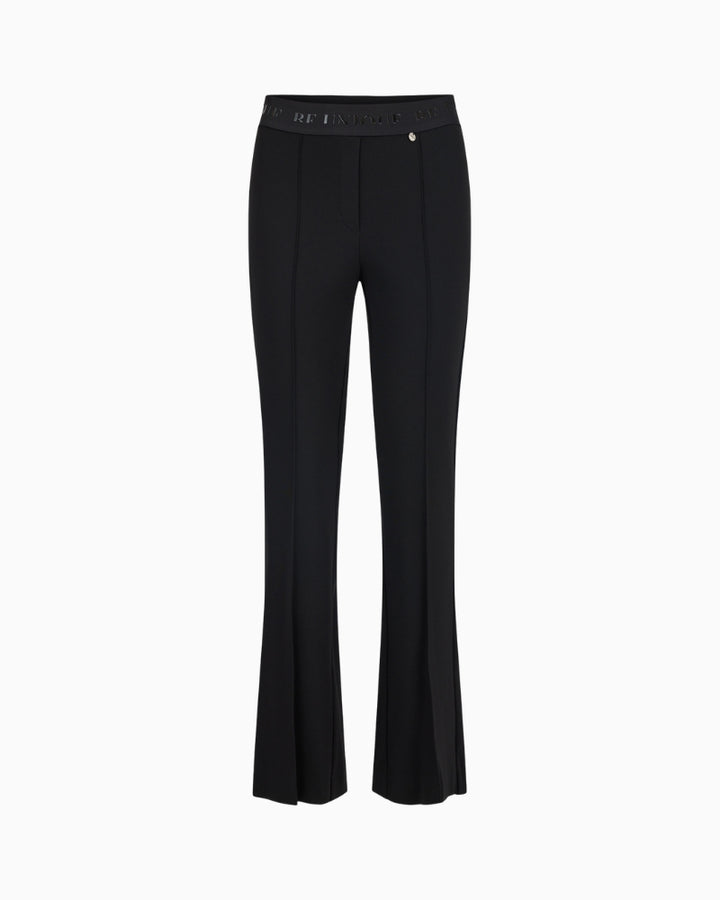 Black kick-flare trousers by Robell Joella with flat waistband and stretch fabric