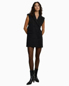 Model wearing Access blazer dress with heels for formal styling