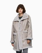 Front view of grey faux fur jacket with button fastening