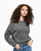 Front view of coal grey knit blouse with rhinestone detail by Access Fashion