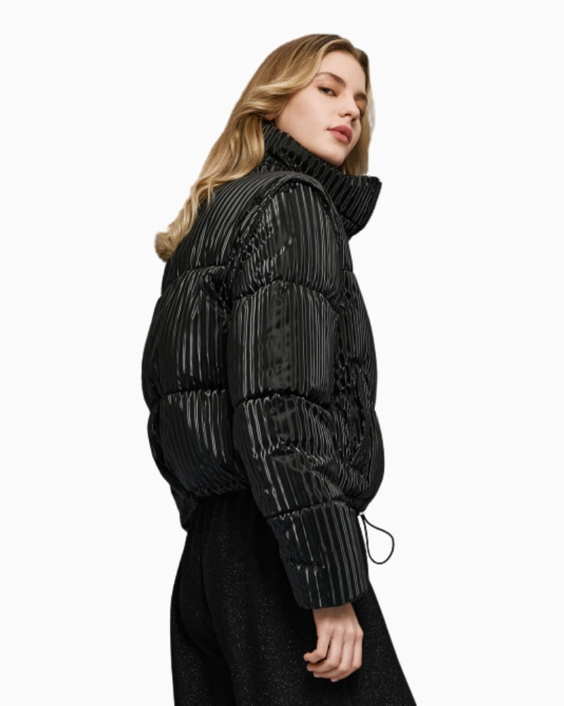 Side view of puffer showing quilted striped effect and regular fit