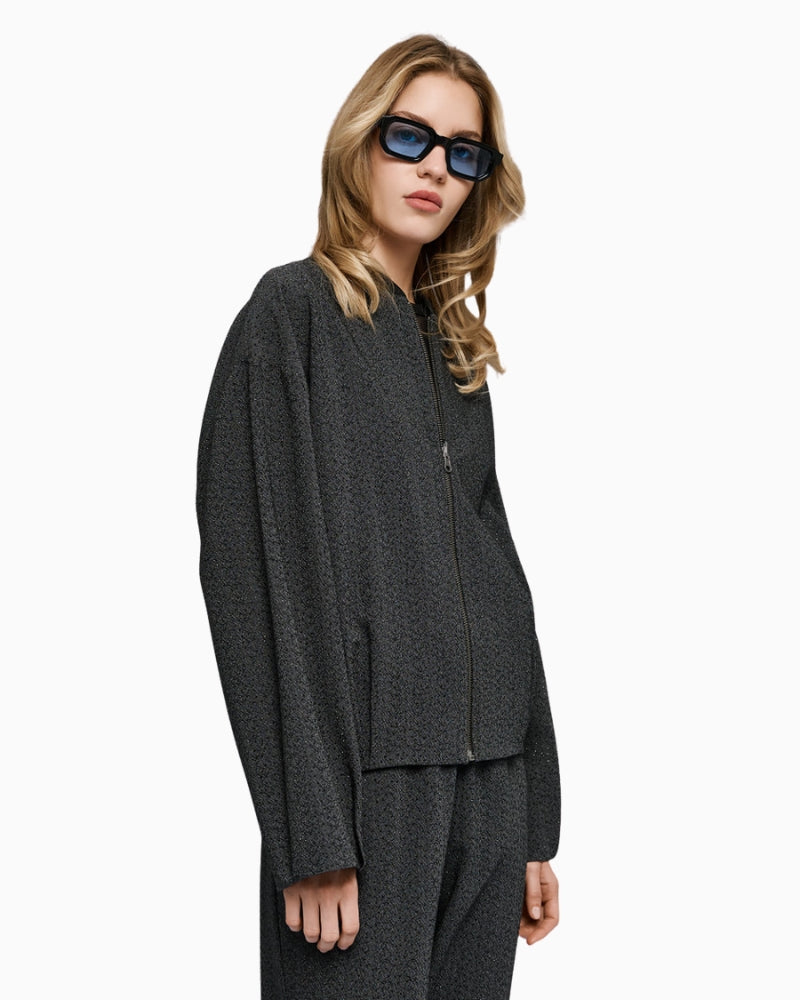 Side view of Access Bomber Jacket showing relaxed fit and pleated sleeve details