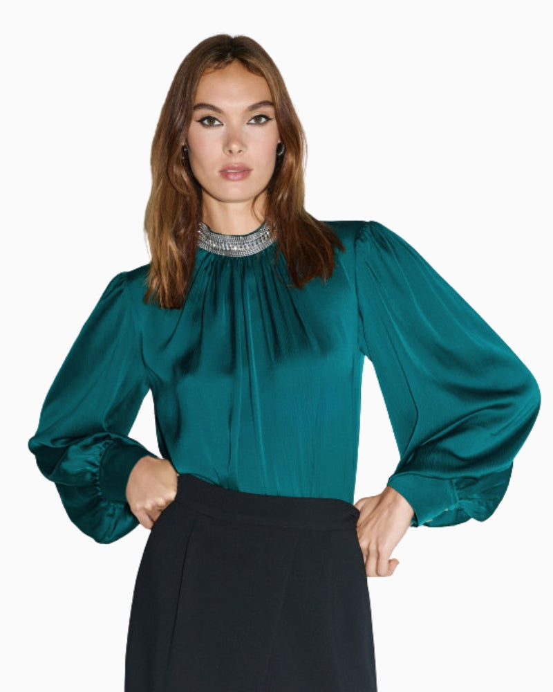 Front view of forest blouse showing high neck and gathered detail