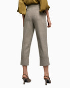 Back view of grey trousers with decorative welt pockets and neat finish