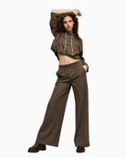 Waistband detail showing elastic front and smooth fabric texture