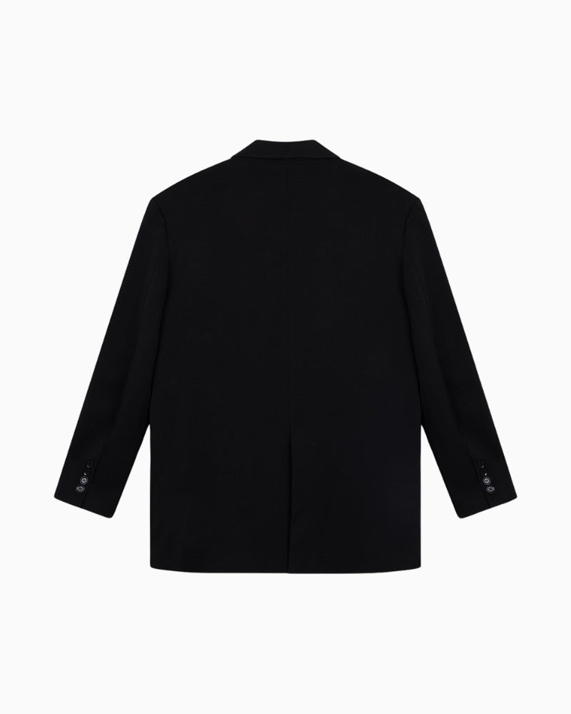 Back view of black grandad blazer with shoulder pads and button cuffs