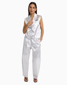 Woman wearing Alix The Label shiny barrel pants silver – Áines Boutique