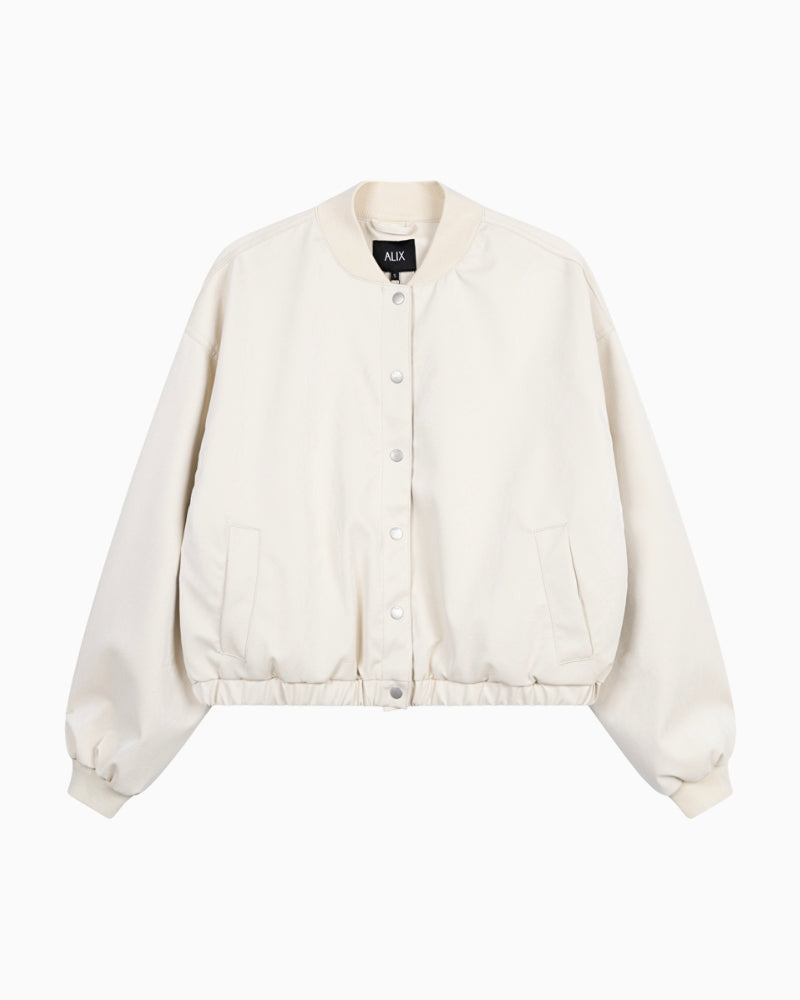 Front view showing textured fabric and bomber silhouette on ALIX jacket