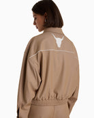 Alix The Label 2 tone jacket camel back view with bull detail