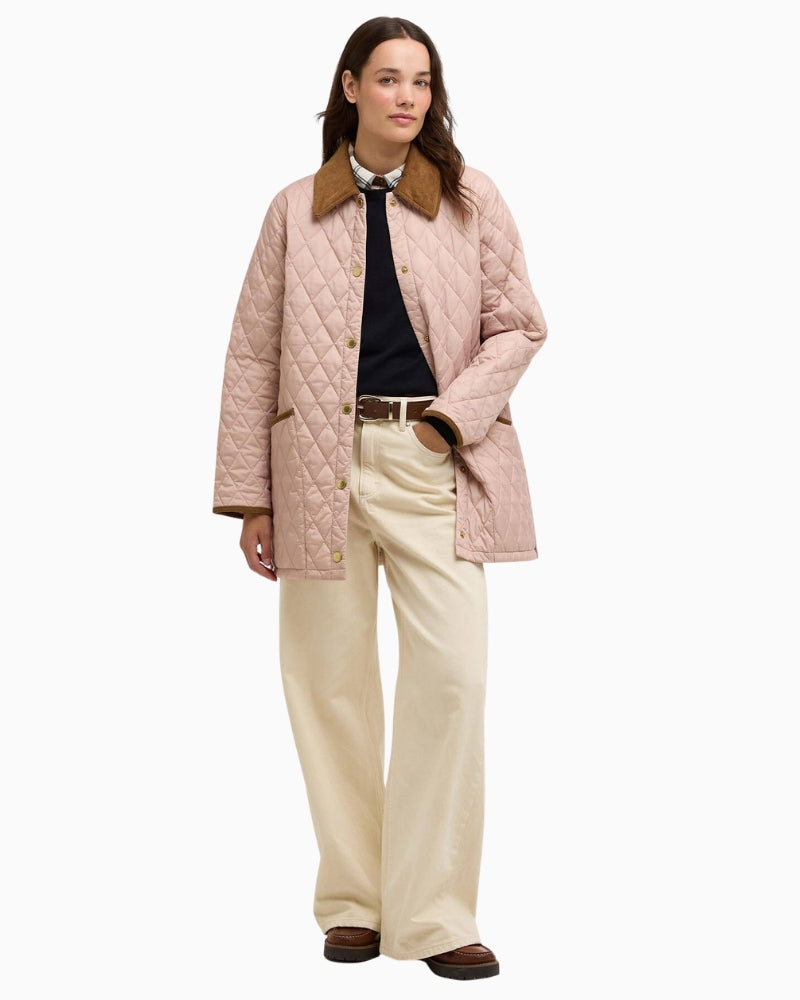 Woman wearing Barbour Modern Liddesdale quilted jacket pink – Áines Boutique
