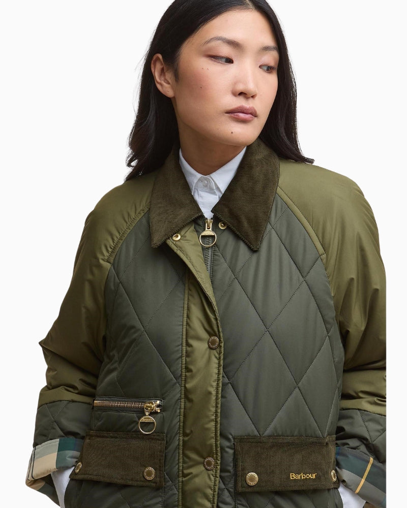 Close-up of cord collar and stud placket on Barbour quilted jacket