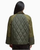 Back view of quilted Barbour jacket highlighting classic cut and texture