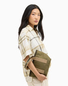 Woman carrying Barbour Mini Mya tote bag – Áines Boutique